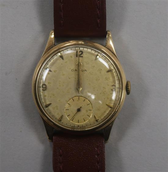 A gentlemans 1950s 9ct gold Omega manual wind wrist watch, movement c.266.